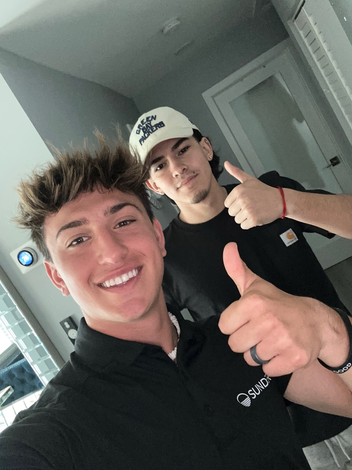 Anthony in his door-to-door days, out in the field with one of his reps
